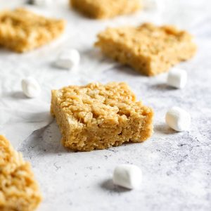 a peanut butter rice krispies treat on a grey table
