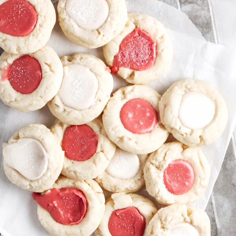 thumbprint cookies with icing in the center.