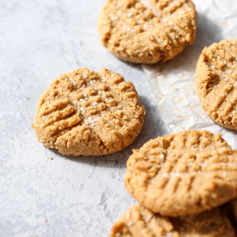 almond flour peanut butter cookies on parchment paper