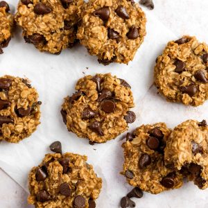 banana oatmeal cookies on parchment paper.