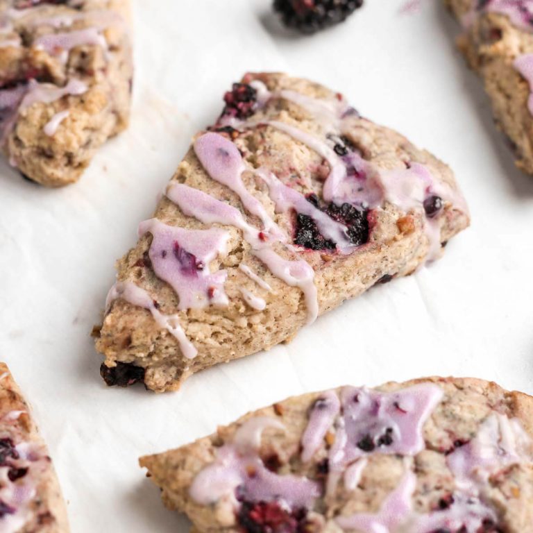 gluten-free blackberry scones on parchment paper
