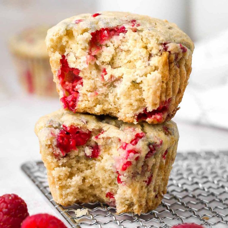 a stack of two vegan raspberry muffins.