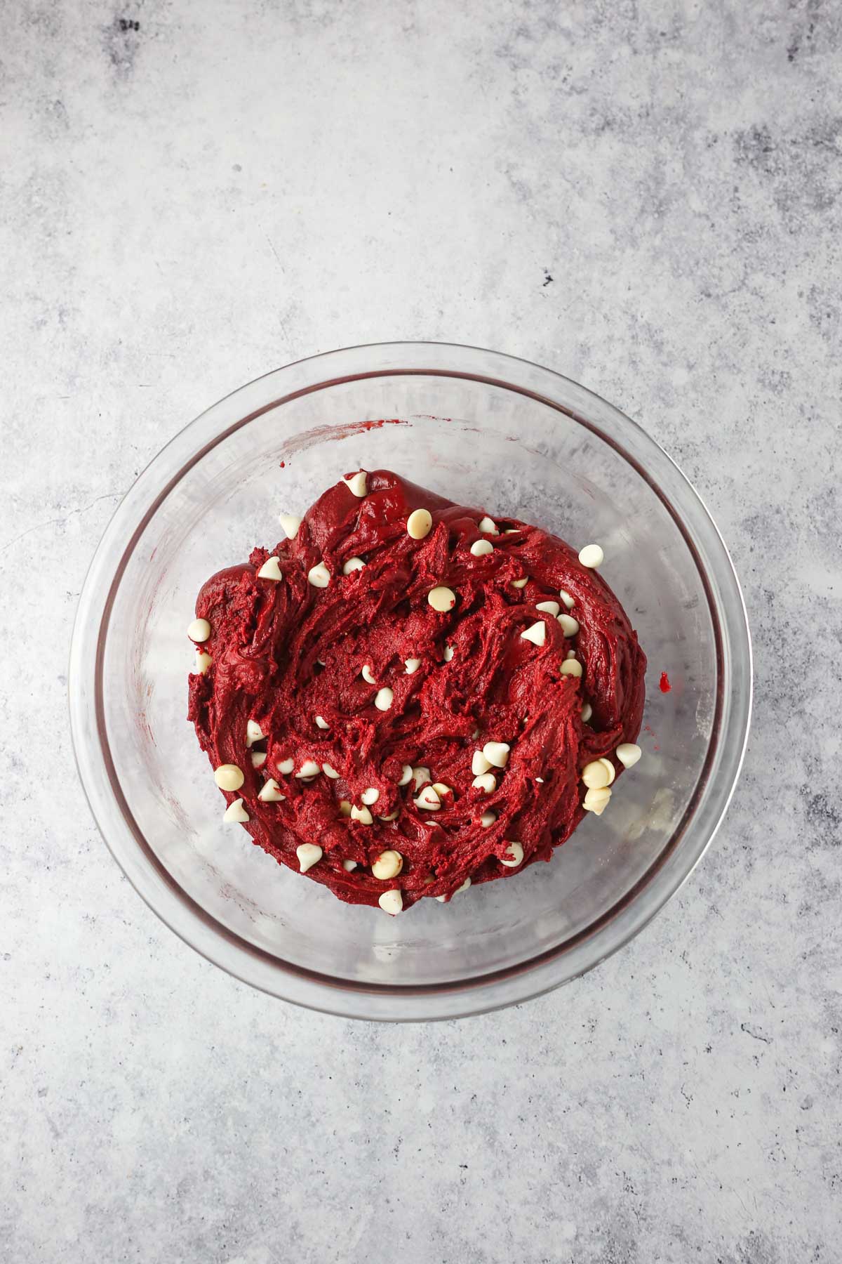 White chocolate chips folded into the red brownie batter.