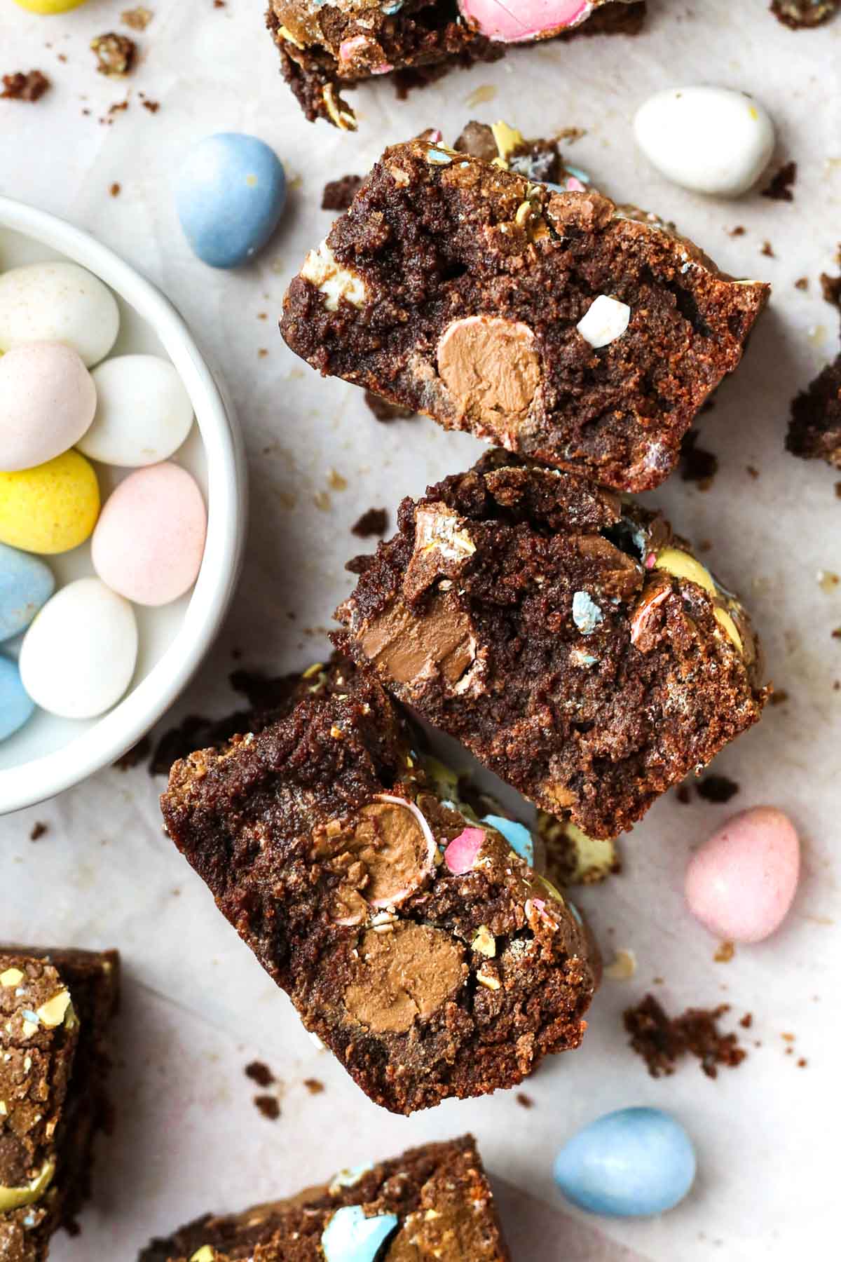 Side view of the inside of moist and fudgy chocolate mini egg brownie,
