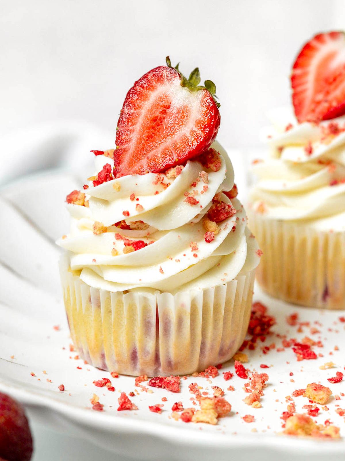 strawberry crunch cupcakes on a plate